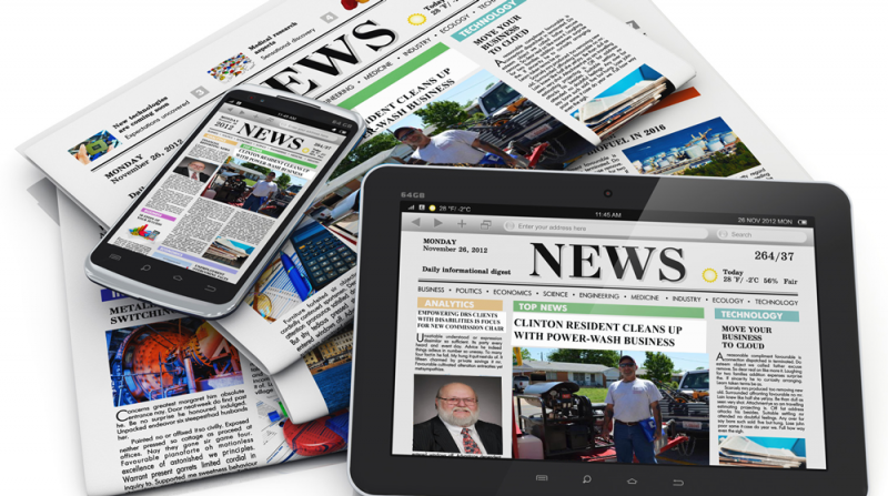 newspapers, smart phones and tablets with news stories showing